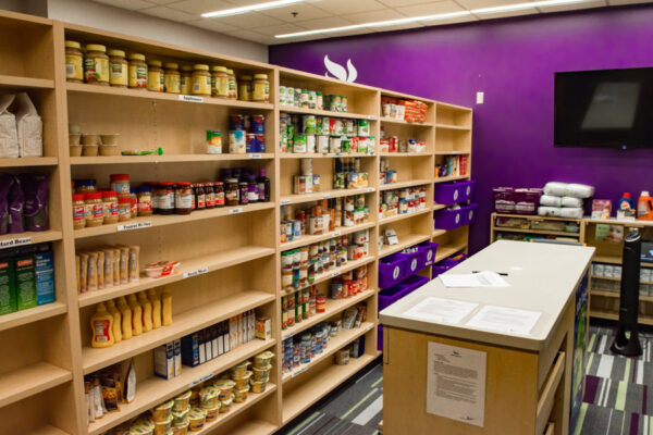 Shelves with food and supplies in the Warrior Cupboard on the WSU campus.